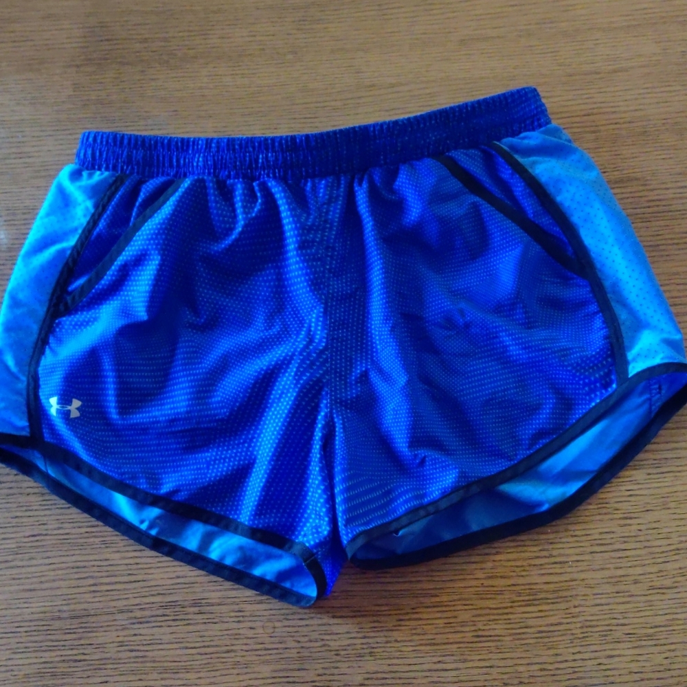Pair of under armour running shorts